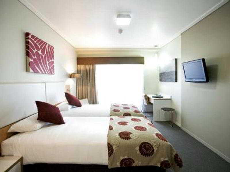 Grand Hotel And Apartments Townsville Quarto foto